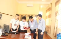 Trao đổi nghiệp vụ công tác kiểm tra, giám sát ở cơ sở tại Đảng ủy xã Lão Hộ, huyện Yên Dũng, Bắc Giang. (Ảnh Quốc trường)