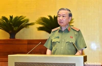 Bộ trưởng Công an Tô Lâm trình bày Tờ trình về dự án Luật tại phiên họp chiều 2/6. (Ảnh: THỦY NGUYÊN)