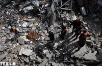 Cảnh đổ nát sau các cuộc không kích của Israel xuống Dải Gaza ngày 27/3/2024. (Ảnh: THX/TTXVN)