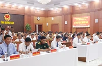 Các đại biểu tập trung nghiên cứu nội dung các báo cáo chuyên đề tại Phiên khai mạc kỳ họp thứ 16, Hội đồng nhân dân tỉnh Quảng Nam.