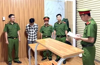 Cơ quan điều tra đọc lệnh bắt tạm giam Trần Quốc Huy.