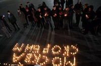 Người dân Nga tưởng niệm các nạn nhân trong vụ tấn công khủng bố ở ngoại ô Moskva. (Ảnh: RIA Novosti) 