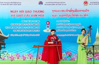 Việt Nam và Lào thúc đẩy giao lưu văn hóa. (Ảnh TTXVN)