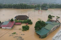 Nhiều khu dân cư trên địa bàn thành phố Hà Giang bị ngập sâu trong nước.