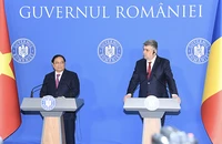Thủ tướng Phạm Minh Chính và Thủ tướng Romania Ion-Marcel Ciolacu tại cuộc gặp gỡ, trao đổi thông tin với báo chí. 