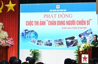 Đại tá Ngô Anh Thu, Phó Tổng Biên tập Báo Quân đội nhân dân phát biểu phát động cuộc thi. (Ảnh: Trường Giang)