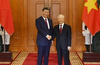 Tổng Bí thư Nguyễn Phú Trọng với Tổng Bí thư, Chủ tịch Trung Quốc Tập Cận Bình. (Ảnh: ĐĂNG KHOA)