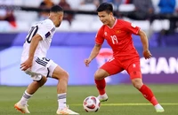 Quang Hải gỡ hòa 2-2 cho đội tuyển Việt Nam ở phút 90+1. (Ảnh: Reuters)