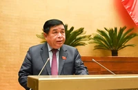 Bộ trưởng Kế hoạch và Đầu tư Nguyễn Chí Dũng trình bày Tờ trình về Quy hoạch tổng thể quốc gia thời kỳ 2021-2030, tầm nhìn đến năm 2050. (Ảnh: DUY LINH)