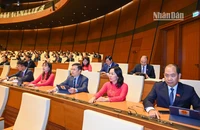 Các đại biểu Quốc hội bấm nút biểu quyết thông qua Nghị quyết về Quy hoạch tổng thể quốc gia thời kỳ 2021-2030, tầm nhìn đến năm 2050. (Ảnh: DUY LINH)