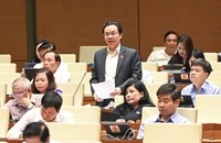 Đại biểu Hoàng Văn Cường (đoàn Hà Nội) cho ý kiến về dự thảo Luật Kinh doanh bất động sản (sửa đổi). (Ảnh: DUY LINH)