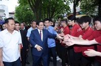 Thủ tướng Chính phủ Phạm Minh Chính giao lưu cùng sinh viên tại Lễ phát động “Cả nước thi đua đổi mới sáng tạo và chuyển đổi số”, vào cuối tháng 4 tại Học viện Công nghệ Bưu chính Viễn thông. (Ảnh TRẦN HẢI)