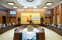 Ủy ban dự thảo sửa đổi, bổ sung một số điều của Hiến pháp năm 2013 biểu quyết thông qua các văn bản về Dự thảo Nghị quyết tại Phiên họp thứ nhất. (Ảnh VPQH)