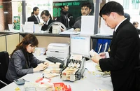 Các hoạt động tài chính đã đạt được nhiều tiến bộ. Ảnh: NGUYỆT ANH