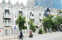 Luật Đất đai mới tạo môi trường pháp lý thông thoáng để doanh nghiệp và người dân dễ dàng tiếp cận. Ảnh: SONG ANH