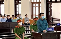 Bị cáo Nguyễn Quang Bình tại phiên tòa xét xử.