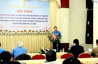 Đại diện Ban Chính sách-Pháp luật Tổng Liên đoàn Lao động Việt Nam phát biểu khai mạc hội thảo.
