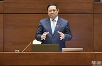 Thủ tướng Phạm Minh Chính trả lời chất vấn của đại biểu Quốc hội. (Ảnh: ĐĂNG KHOA)