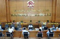 Giải quyết các thủ tục hành chính tại Trung tâm Phục vụ hành chính công tỉnh Bắc Giang. (Ảnh minh họa: TTXVN)