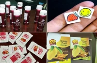 "Nước vui", "bùa lưỡi", "bột dâu", "bột xoài" với hình thức bắt mắt dễ dàng qua mặt lực lượng chức năng. (Ảnh: Cơ quan chức năng cung cấp)