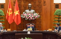 Thủ tướng Phạm Minh Chính chủ trì cuộc họp của Thường trực Chính phủ với các bộ, ngành nhằm tìm giải pháp ứng phó sau khi Hoa Kỳ tuyên bố áp thuế đối ứng với các nước. (Ảnh: Báo Nhân Dân)