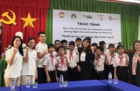 Bàn giao máy lọc nước tại Trường tiểu học và THCS Sơn Nham II. (Ảnh: C Asean cung cấp)