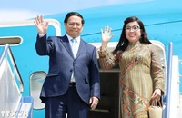 Thủ tướng Phạm Minh Chính và Phu nhân. (Nguồn: TTXVN)