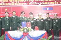Học viện Quân y Việt Nam và Học viện Quân y Lào ký kết Biên bản ghi nhớ hợp tác. (Ảnh: Hải Tiến)