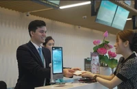 Hành khách làm thủ tục tại Nhà ga T3 Tân Sơn Nhất.
