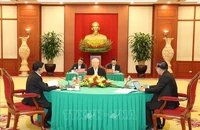 Tổng Bí thư Đảng Cộng sản Việt Nam Nguyễn Phú Trọng, Chủ tịch Đảng Nhân dân Campuchia (CPP) Samdech Techo Hun Sen và Tổng Bí thư Đảng Nhân dân Cách mạng Lào, Chủ tịch nước Lào Thongloun Sisoulith tại cuộc gặp cấp cao Việt Nam-Campuchia-Lào. (Ảnh: TTXVN)