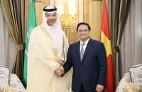Thủ tướng Phạm Minh Chính và Phó Chủ tịch Điều hành Tập đoàn Aramco Yasser M.Mufti. (Ảnh: Dương Giang)