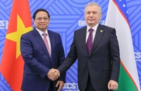 Thủ tướng Chính phủ Phạm Minh Chính và Tổng thống Uzbekistan Shavkat Mirziyoyev (Ảnh: Nhật Bắc/VGP)