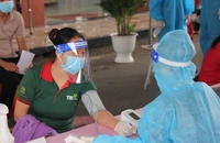 Tiêm vaccine phòng ngừa Covid-19. Ảnh: Báo Nhân Dân