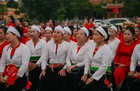 Đại biểu, khách mời phụ nữ dân tộc thiểu số hành động vì bình đẳng giới tại liên hoan.