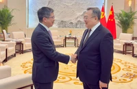 Đại sứ Việt Nam tại Trung Quốc Phạm Thanh Bình và Trưởng Ban Liên lạc Đối ngoại Trung ương Đảng Cộng sản Trung Quốc Lưu Kiến Siêu.