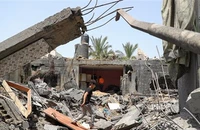 Những ngôi nhà bị phá hủy sau cuộc không kích tại Gaza ngày 12/5/2023. (Ảnh: THX/TTXVN)
