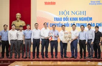 Báo Nhân Dân và Tạp chí Cộng sản trao đổi kinh nghiệm về chuyển đổi số báo chí