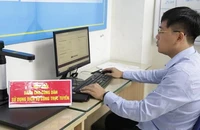 Thí điểm 2 nhóm dịch vụ công liên thông liên quan đến bảo hiểm xã hội, bảo hiểm y tế tại phường Trần Hưng Đạo, Hà Nội. (Ảnh: Tâm Trung)