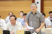 Thiếu tướng Hoàng Anh Tuyên, Phó Chánh văn phòng Bộ Công an trả lời tại họp báo. (ẢNH: VGP)