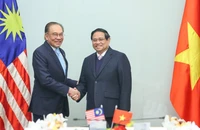 Thủ tướng Chính phủ Phạm Minh Chính và Thủ tướng Malaysia Anwar Ibrahim. (Ảnh: TRẦN HẢI)