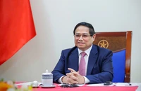 Thủ tướng Chính phủ Phạm Minh Chính điện đàm với Thủ tướng Malaysia Anwar Ibrahim (Ảnh: TRẦN HẢI).