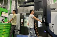 Hoạt động sản xuất của doanh nghiệp tại Khu công nghệ cao Hòa Lạc. (Ảnh: HÀ LINH)