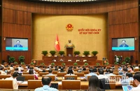 Quốc hội làm việc tại Hội trường nghe Tờ trình dự thảo Nghị quyết của Quốc hội sửa đổi, bổ sung một số điều của Hiến pháp năm 2013. (Ảnh: BÙI GIANG)