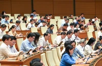 Quốc hội họp phiên toàn thể tại hội trường nghe Tờ trình và Báo cáo thẩm tra dự thảo Nghị quyết của Quốc hội về một số cơ chế, chính sách đặc biệt, tạo đột phá trong xây dựng và tổ chức thi hành pháp luật. (Ảnh: BÙI GIANG)