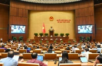 Quốc hội thảo luận ở hội trường về dự thảo Nghị quyết của Quốc hội về một số cơ chế, chính sách đặc biệt, tạo đột phá trong xây dựng và tổ chức thi hành pháp luật. (Ảnh: BÙI GIANG)