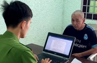 Đối tượng Hứa Thanh Nghĩa tại cơ quan công an.