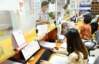 Tiếp nhận đơn đăng ký bảo hộ sở hữu trí tuệ tại Cục Sở hữu trí tuệ. (Ảnh MỸ HÀ)