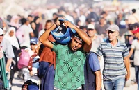 Nhiều người dân Gaza phải sơ tán do xung đột. (Ảnh REUTERS)