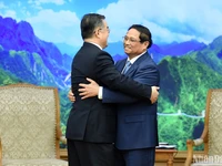 Thủ tướng Phạm Minh Chính đón Phó Ủy viên trưởng Ủy ban thường vụ Đại hội đại biểu Nhân dân toàn quốc Trung Quốc Trương Khánh Vĩ. 