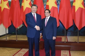 Thủ tướng Chính phủ Phạm Minh Chính và Tổng Bí thư, Chủ tịch Trung Quốc Tập Cận Bình. (Ảnh: TRẦN HẢI) 